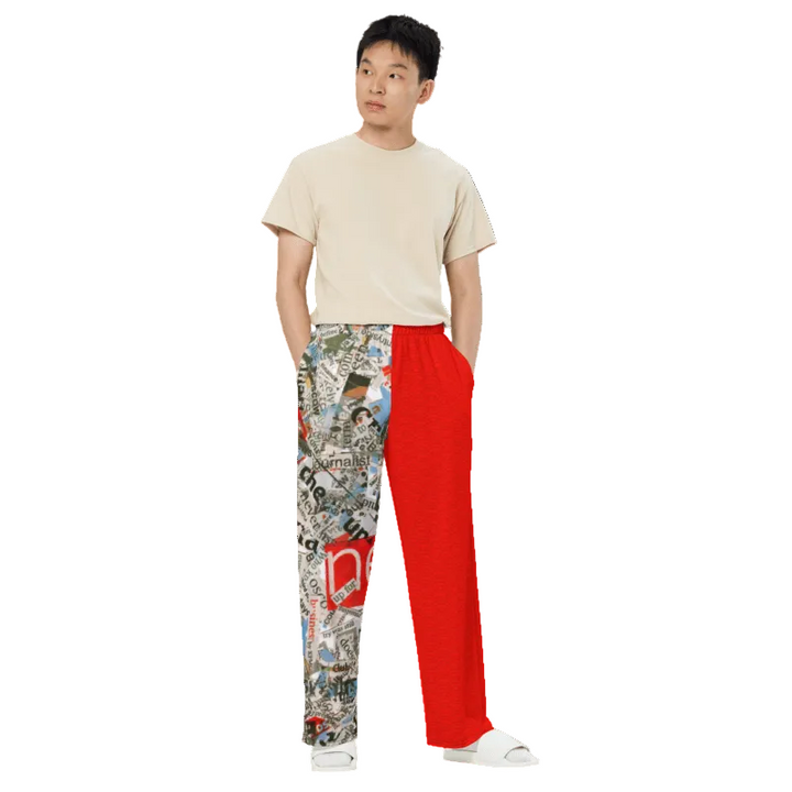 Person wearing a beige t-shirt and colorful patterned pants with a red section on a white background